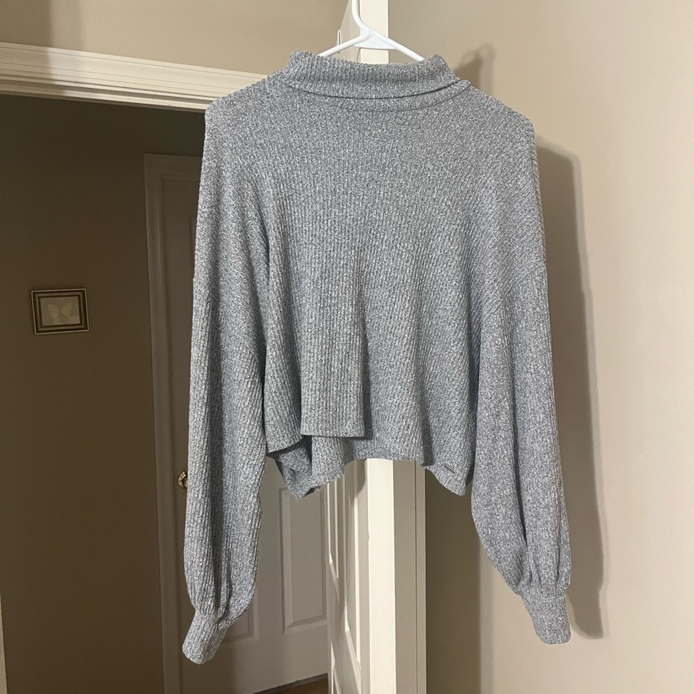 A grey sweater